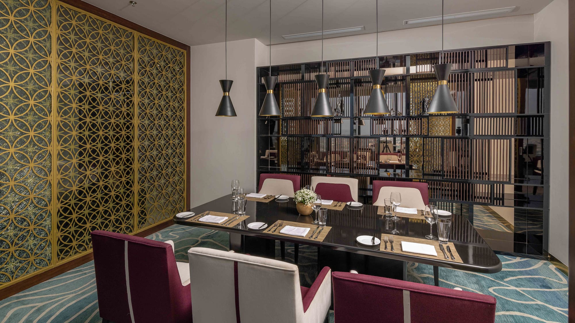 a room with a table and chairs