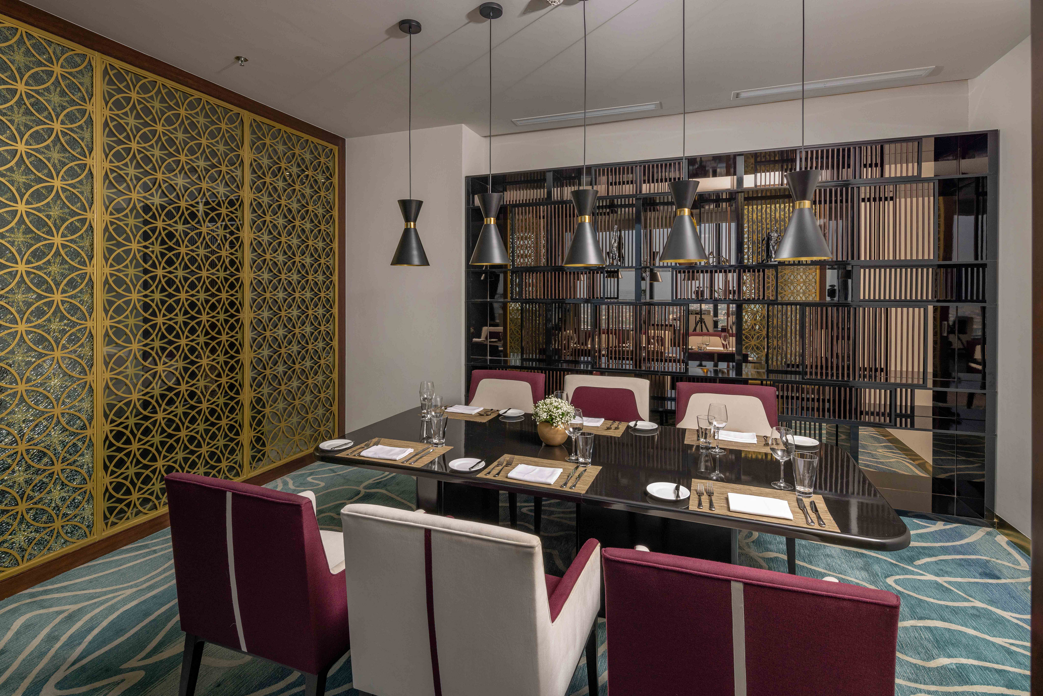 a room with a table and chairs