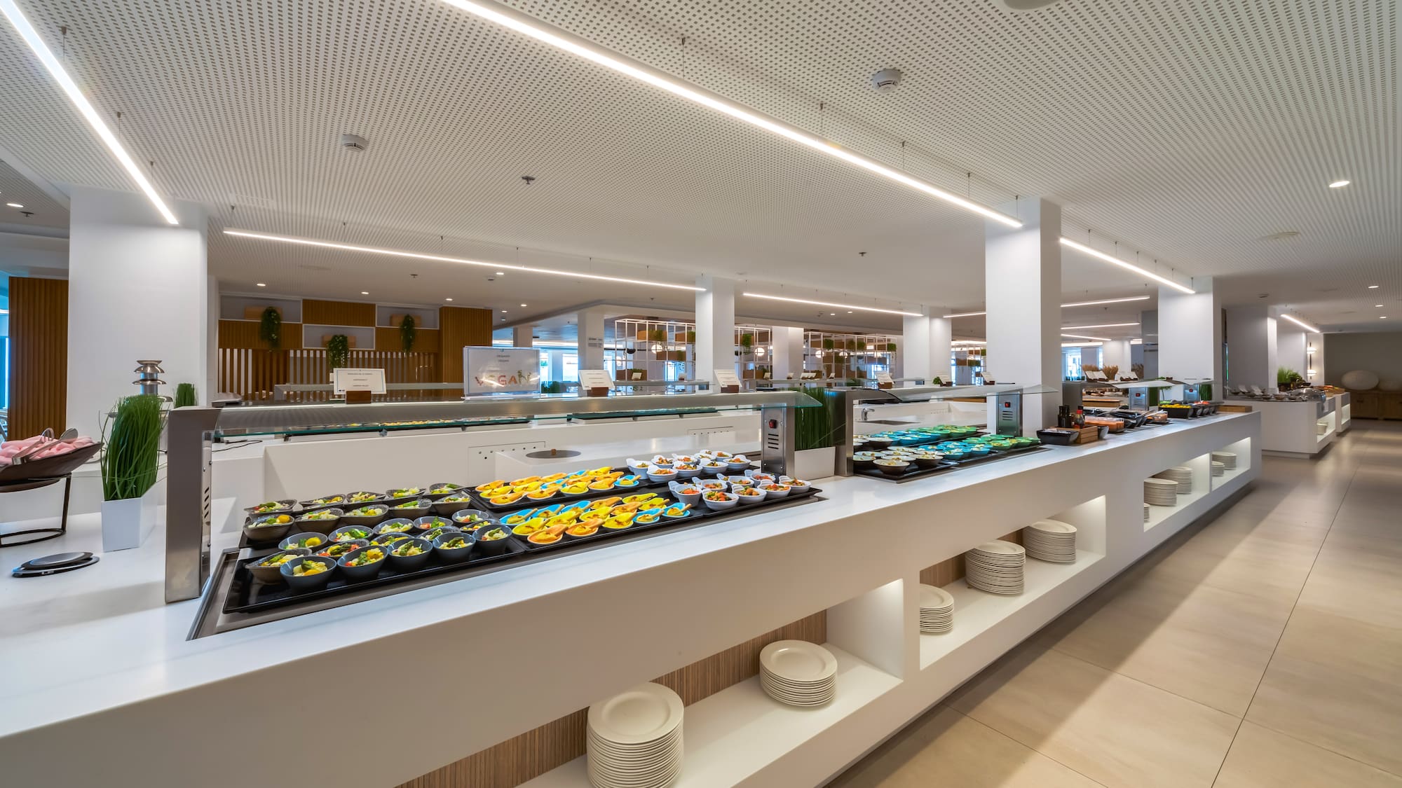 a buffet line with food on it