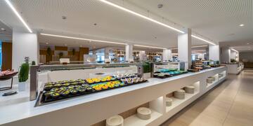 a buffet line with food on it