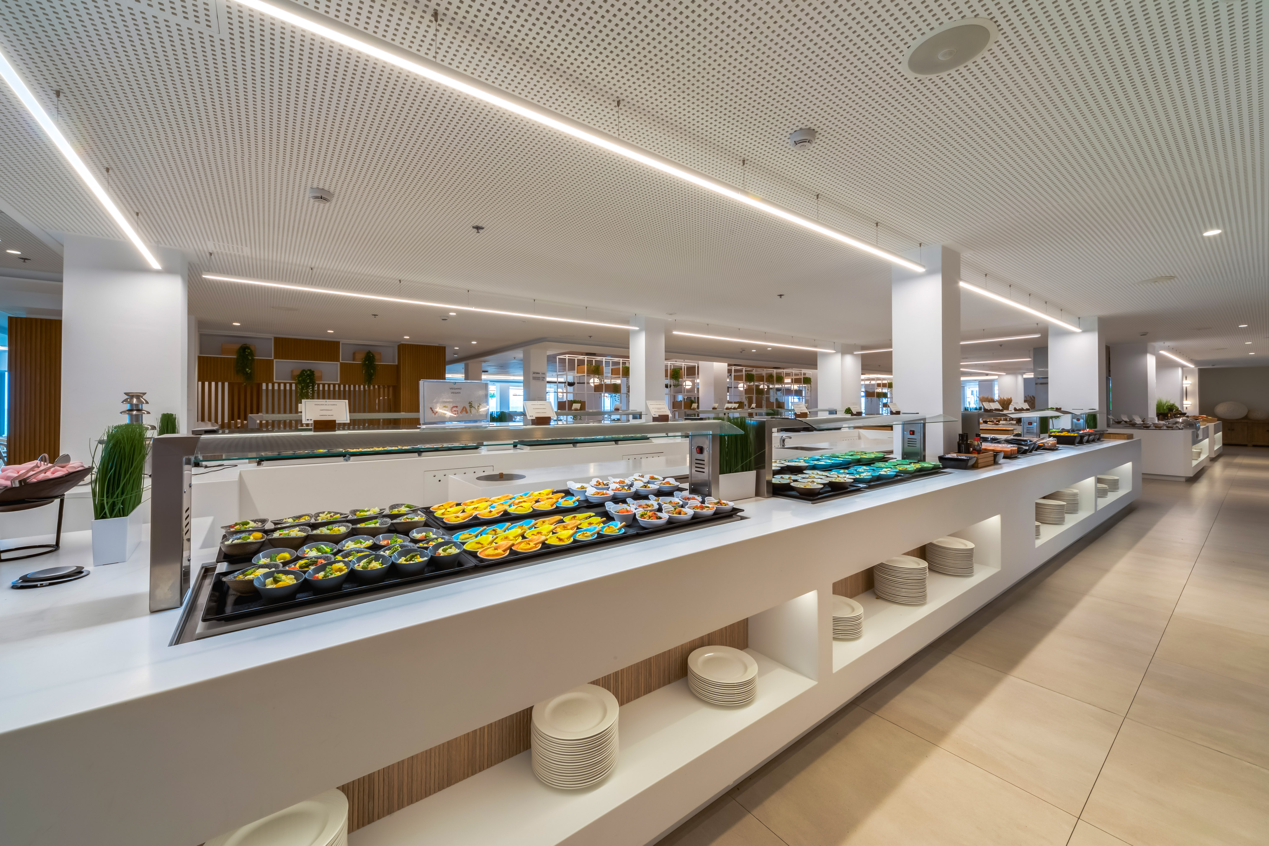 a buffet line with food on it