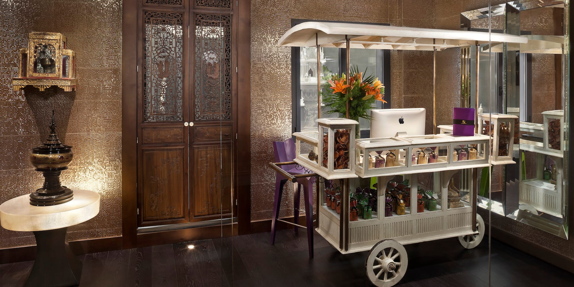 a cart with a computer in it