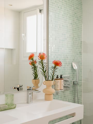 a bathroom with a sink and a mirror