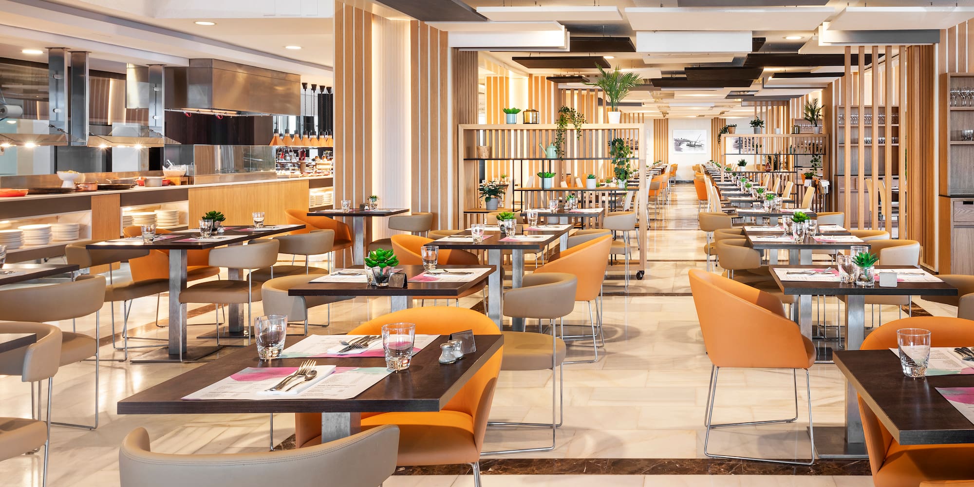 a restaurant with tables and chairs