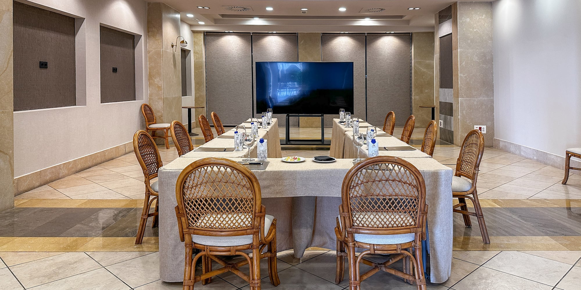 a room with a table and chairs