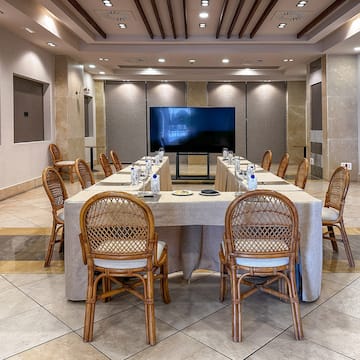 a room with a table and chairs