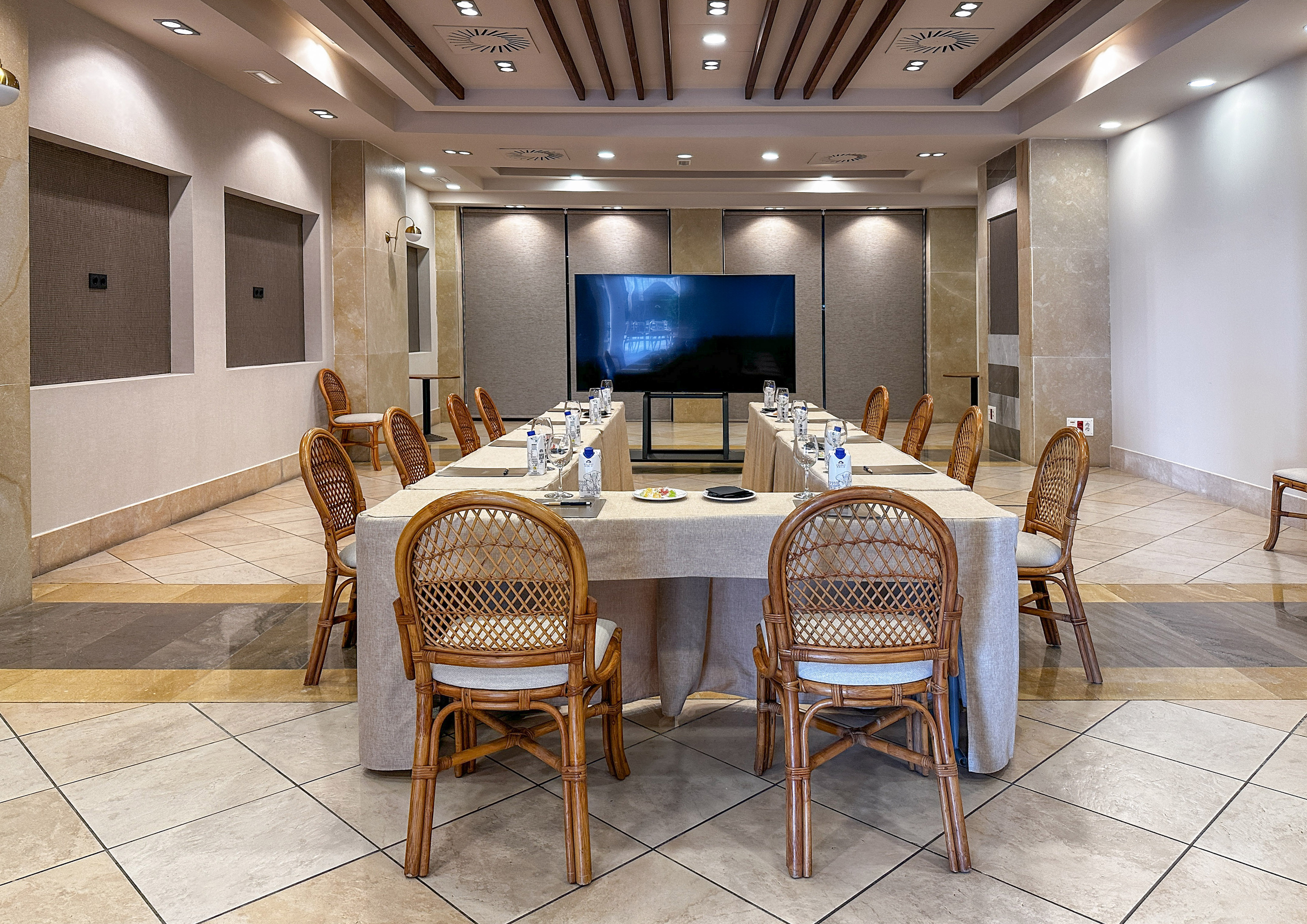 a room with a table and chairs