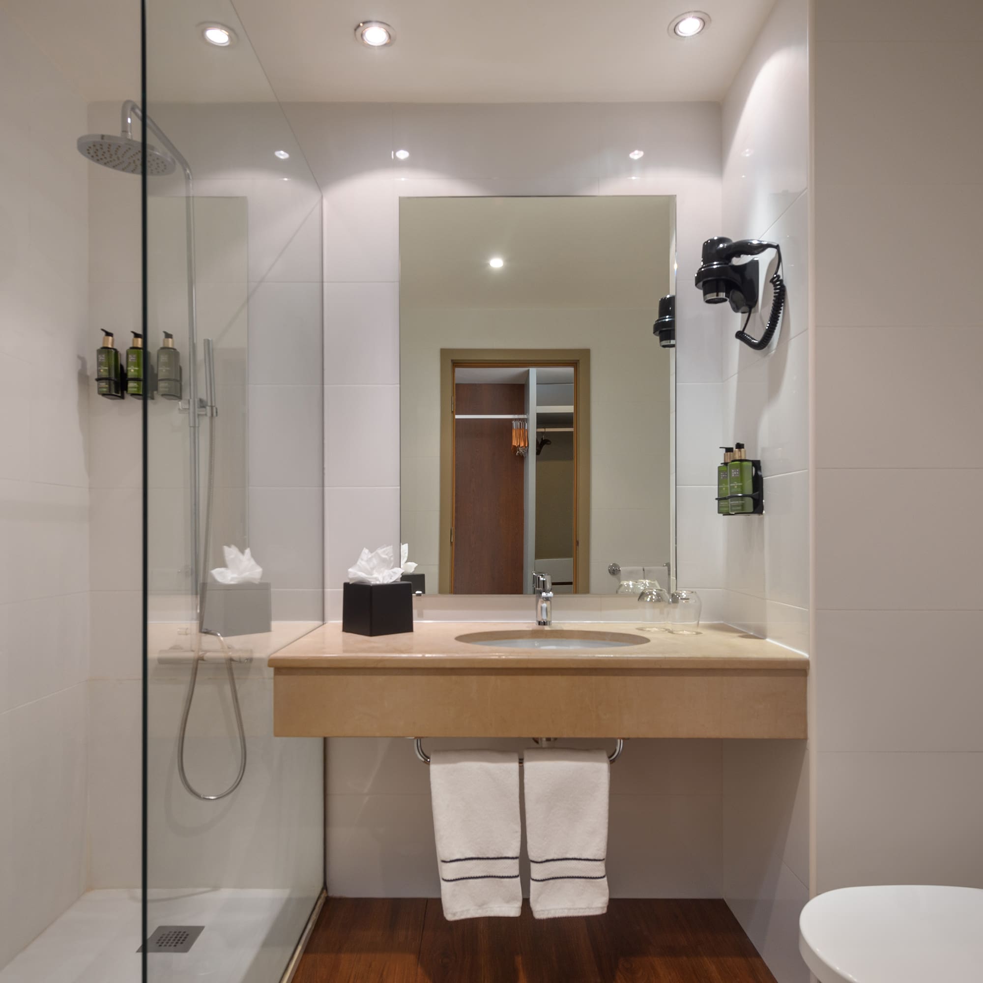 a bathroom with a sink and shower