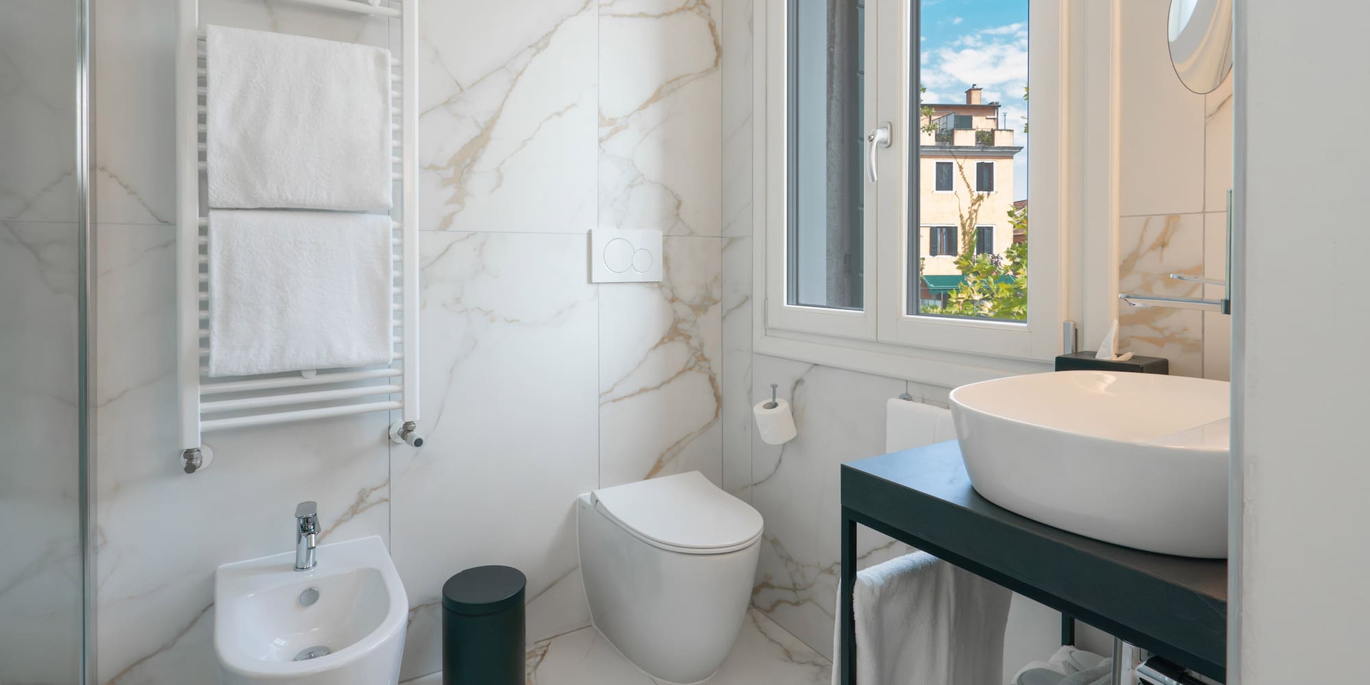 a bathroom with a sink and toilet