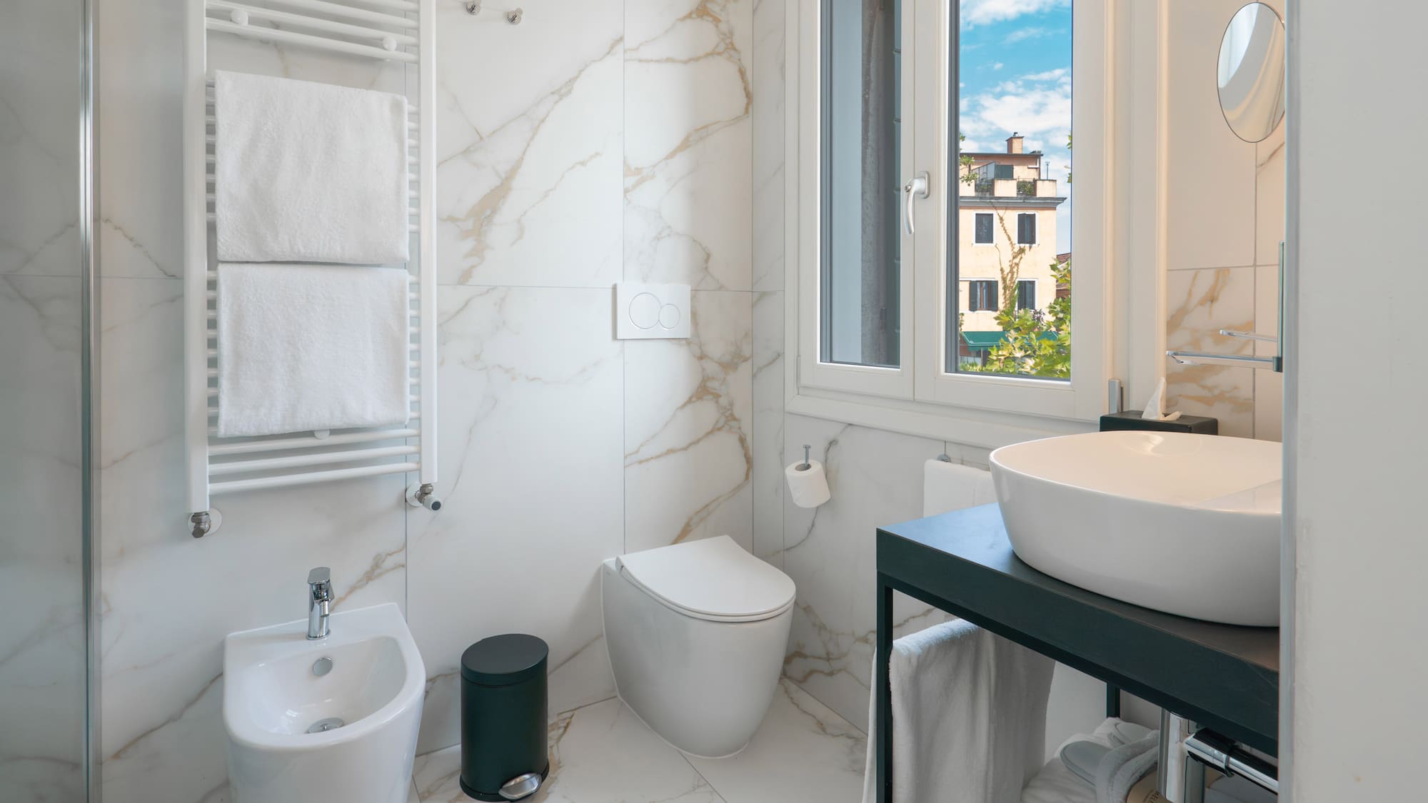 a bathroom with a sink and toilet