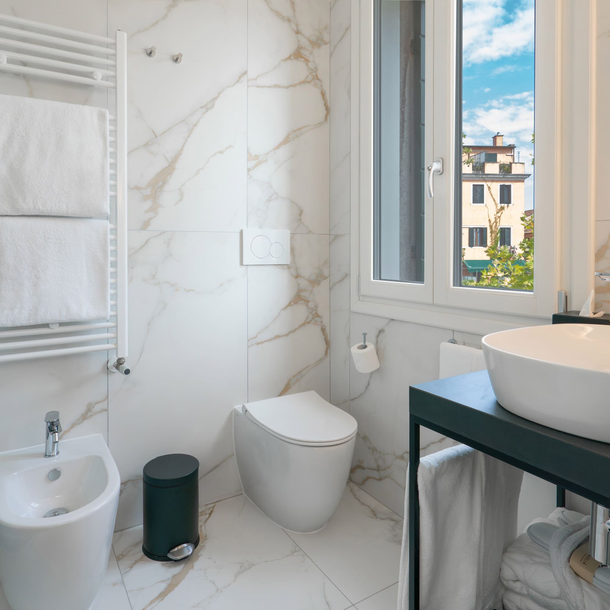 a bathroom with a sink and toilet