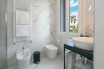 a bathroom with a sink and toilet