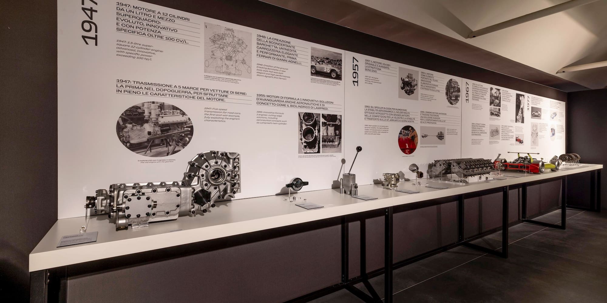 a display of mechanical parts on a white surface