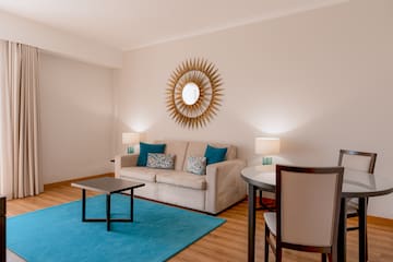 a living room with a couch and table