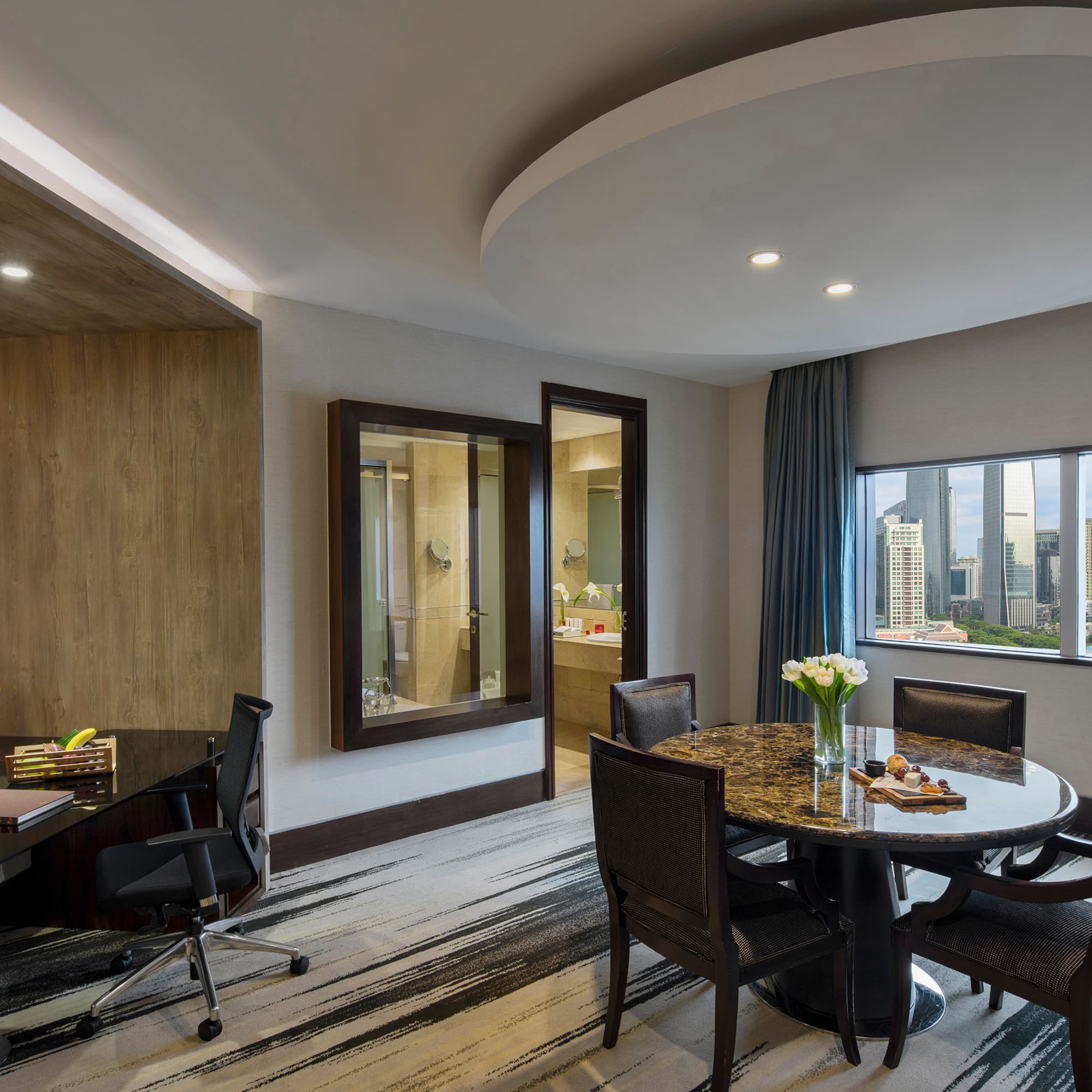 a room with a table and chairs