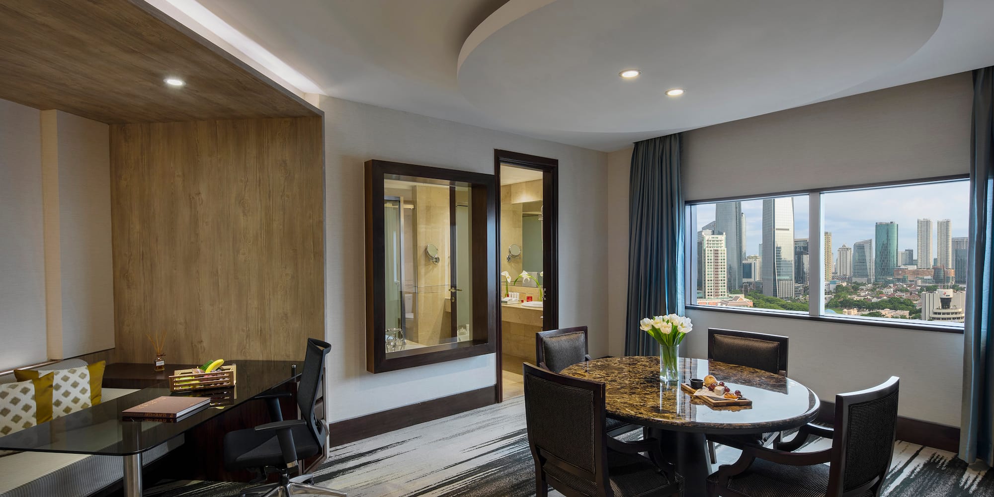 a room with a table and chairs