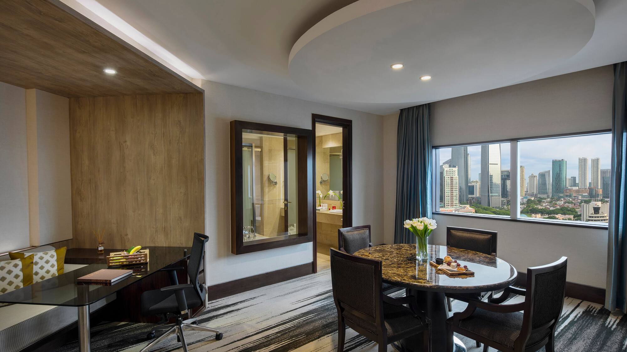 a room with a table and chairs