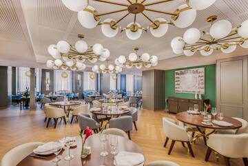 a room with tables and chairs