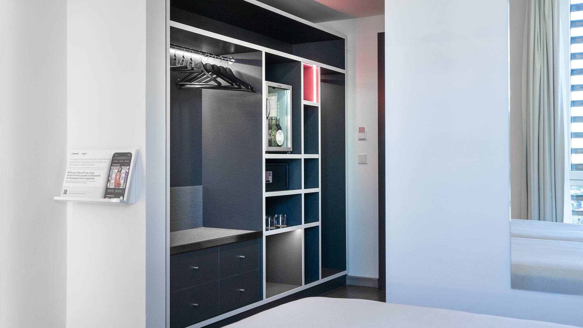 a room with a closet and a bed