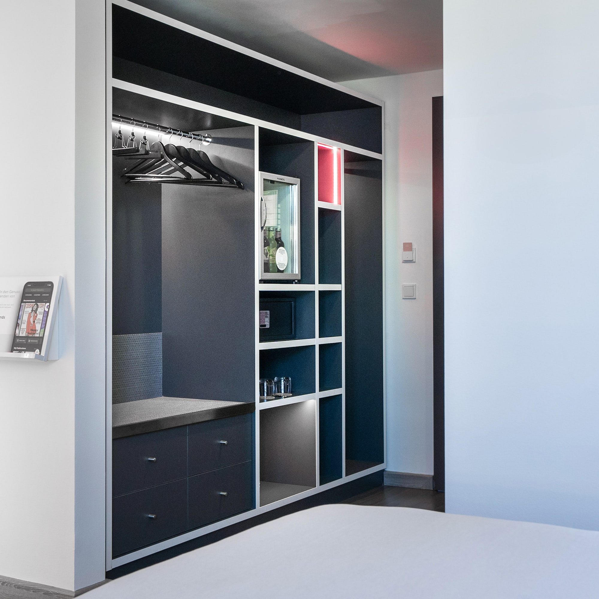 a room with a closet and a bed