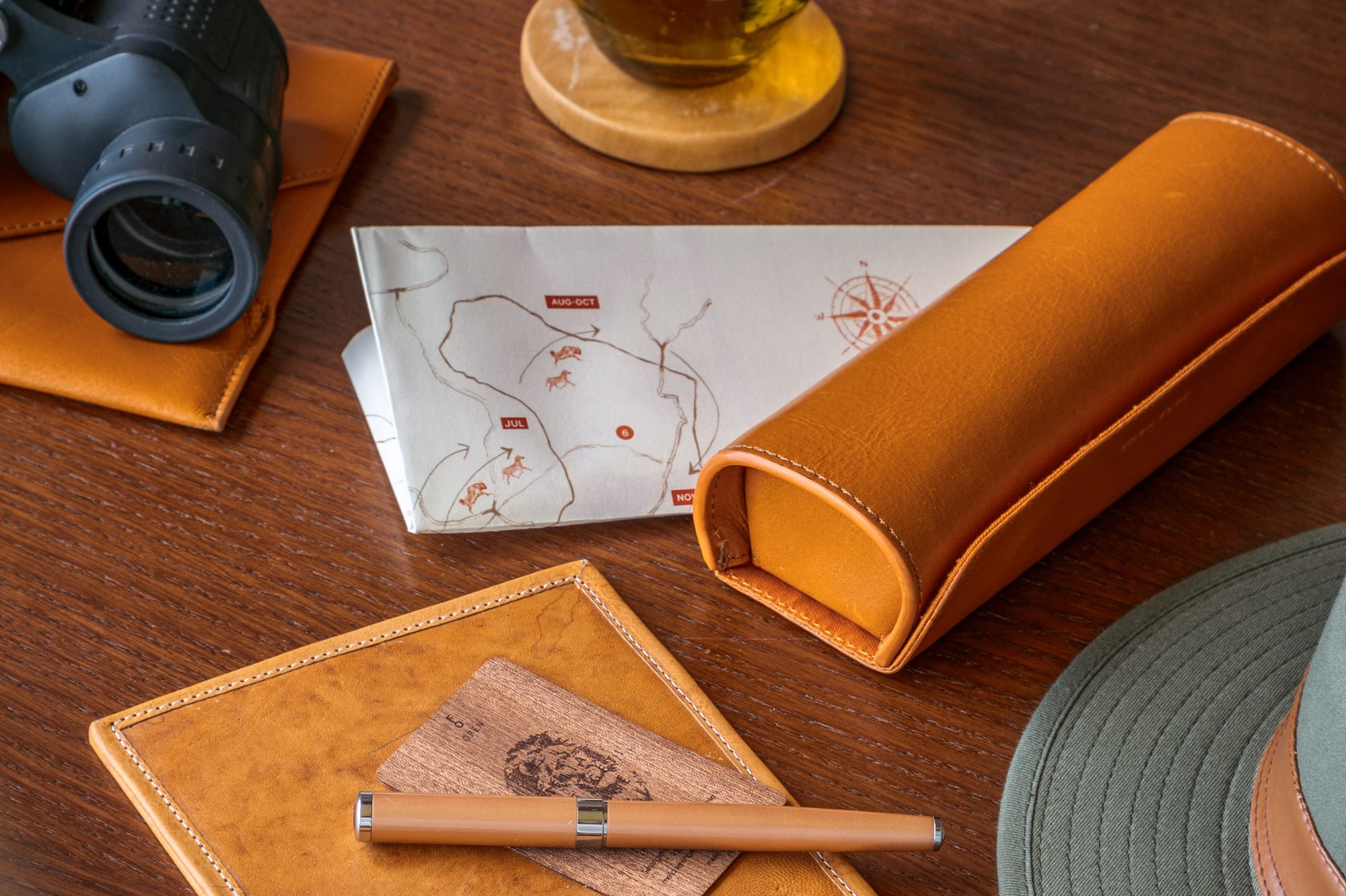 a pen and glasses on a table