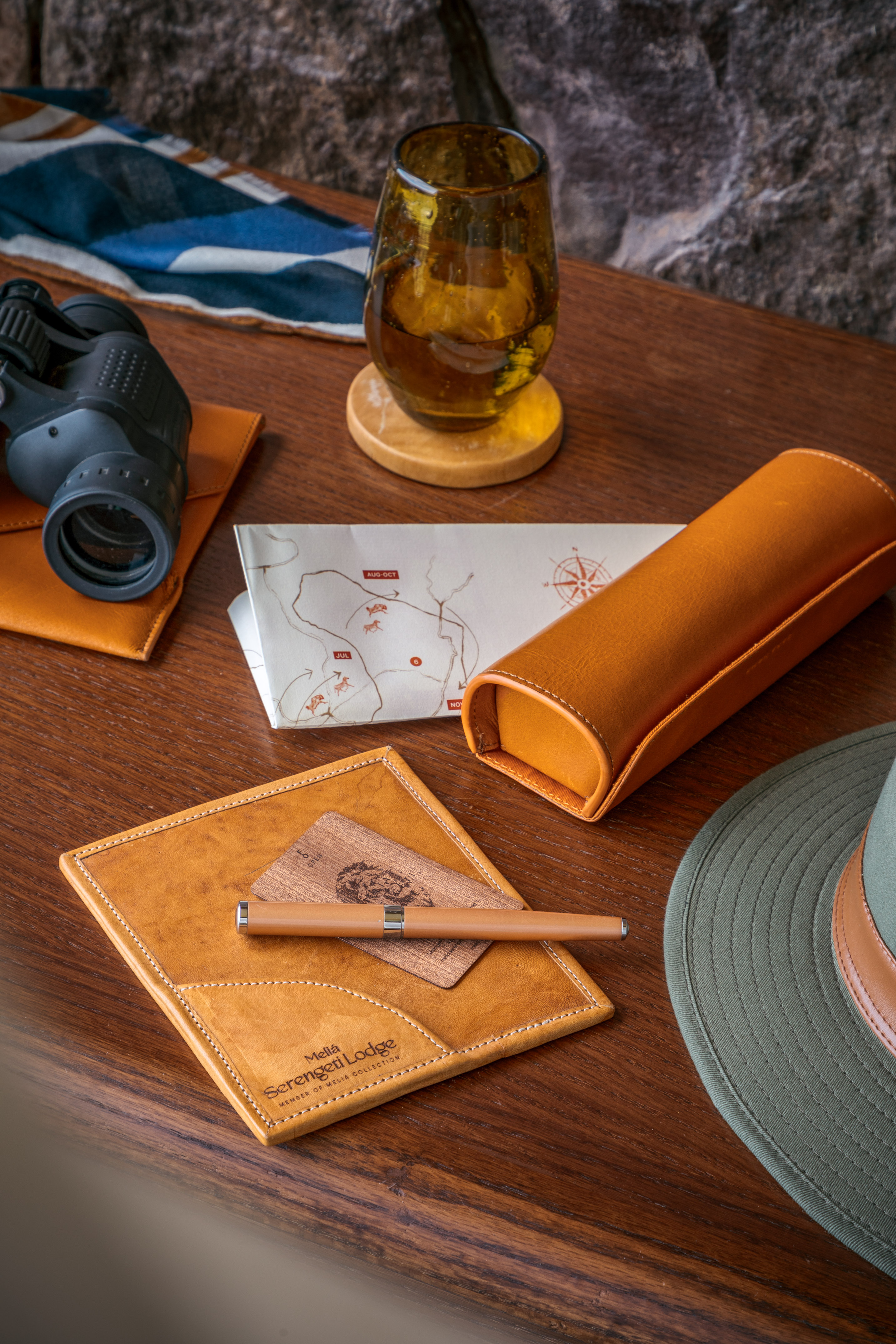 a pen and glasses on a table