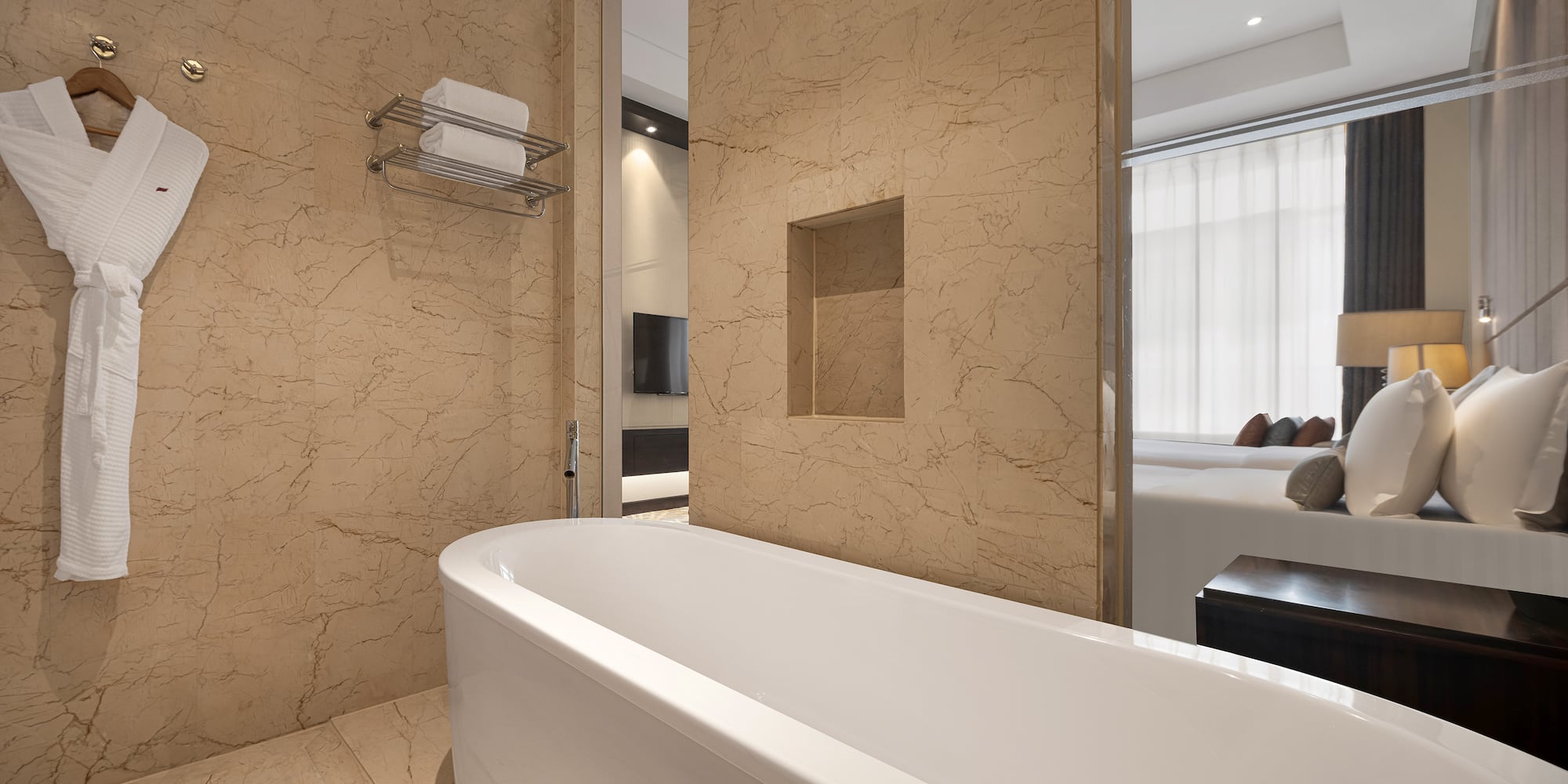 a bathroom with a bathtub and a mirror