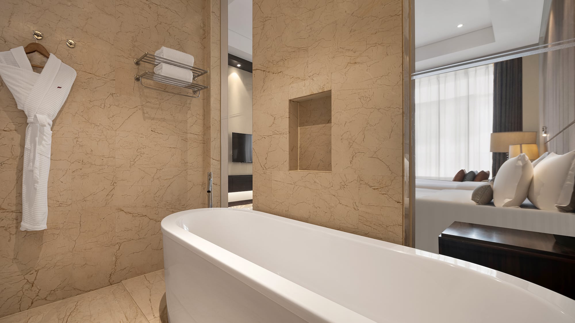 a bathroom with a bathtub and a mirror