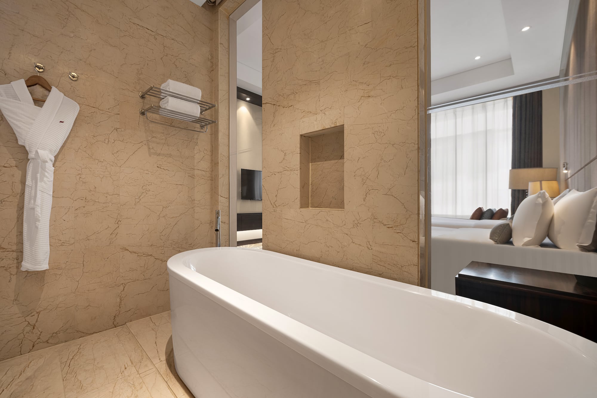 a bathroom with a bathtub and a mirror