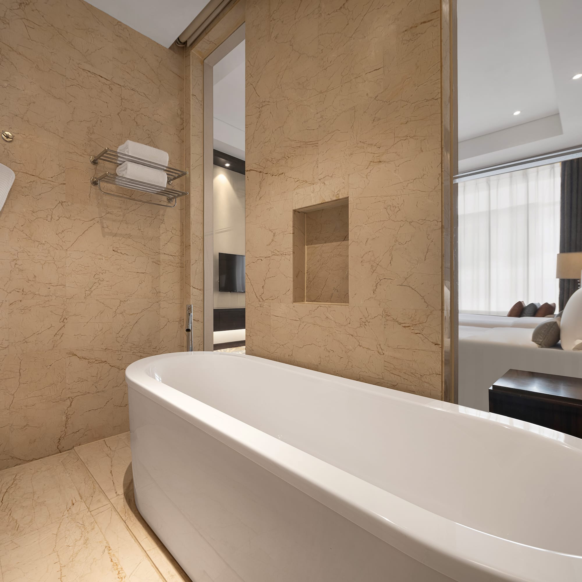 a bathroom with a bathtub and a mirror