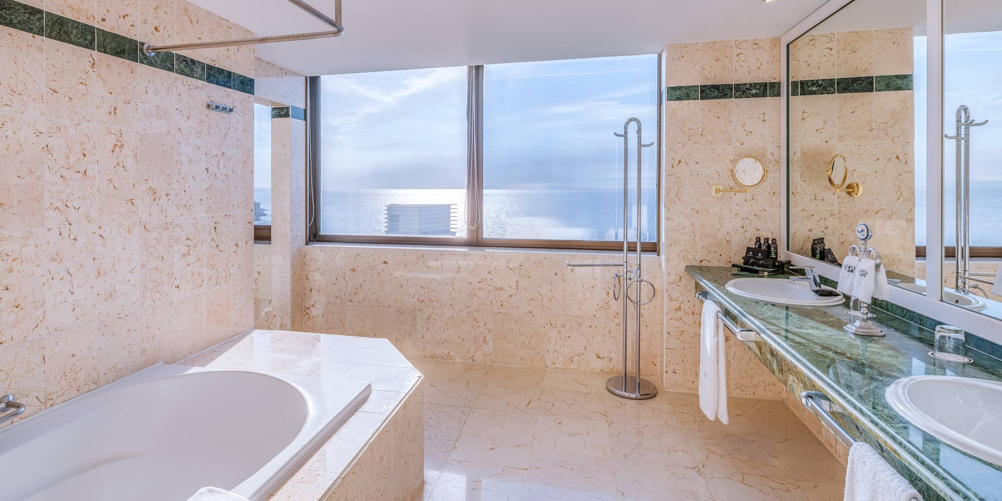 a bathroom with a tub and sink