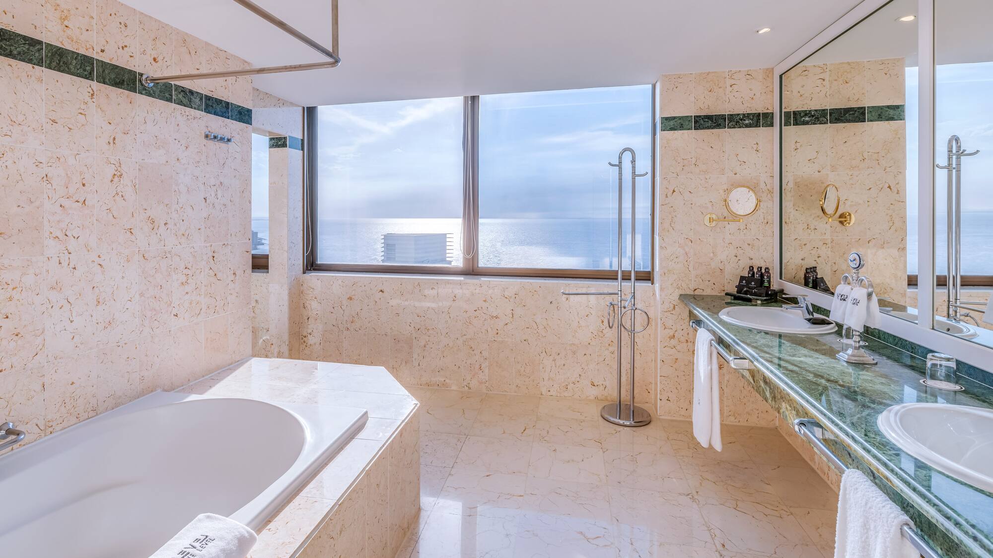 a bathroom with a tub and sink
