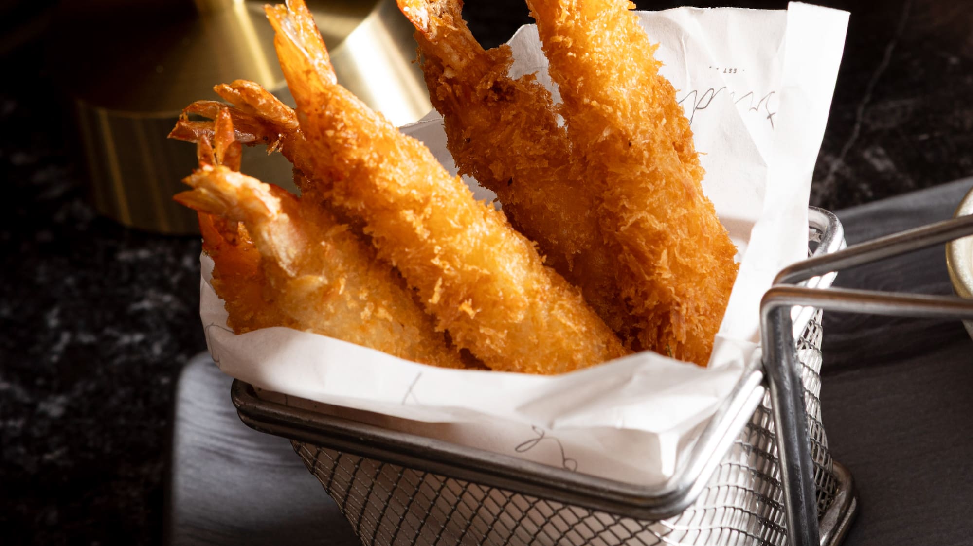 a basket of fried shrimp