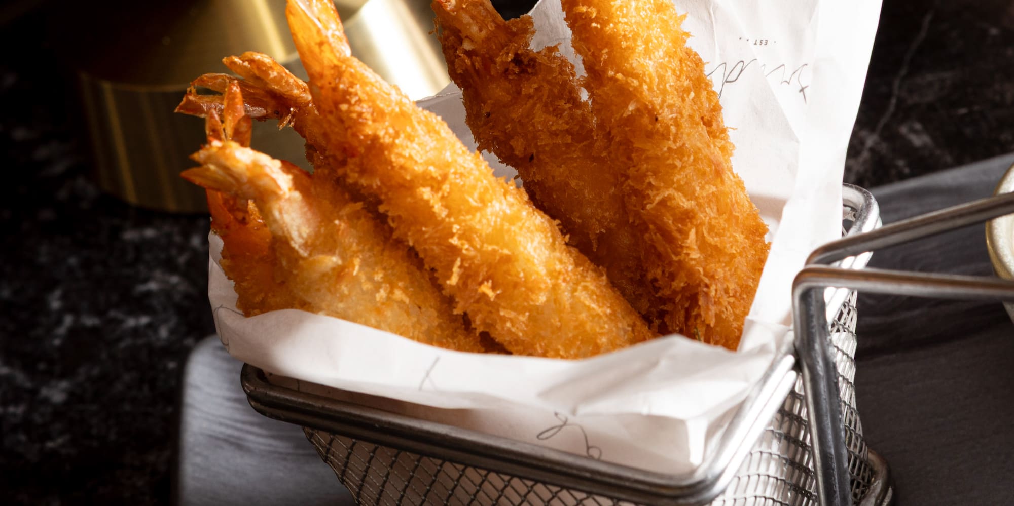 a basket of fried shrimp