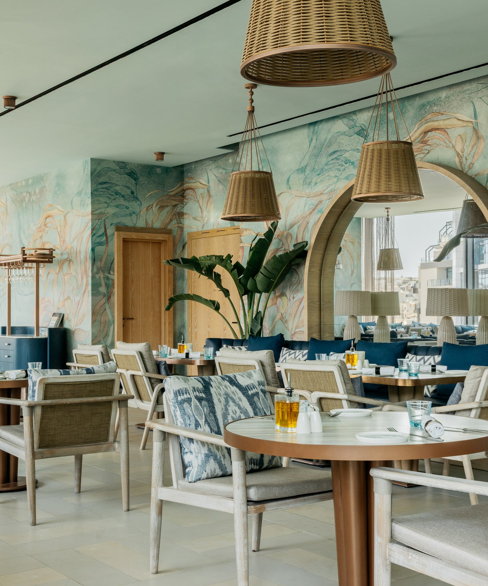 a restaurant with tables and chairs