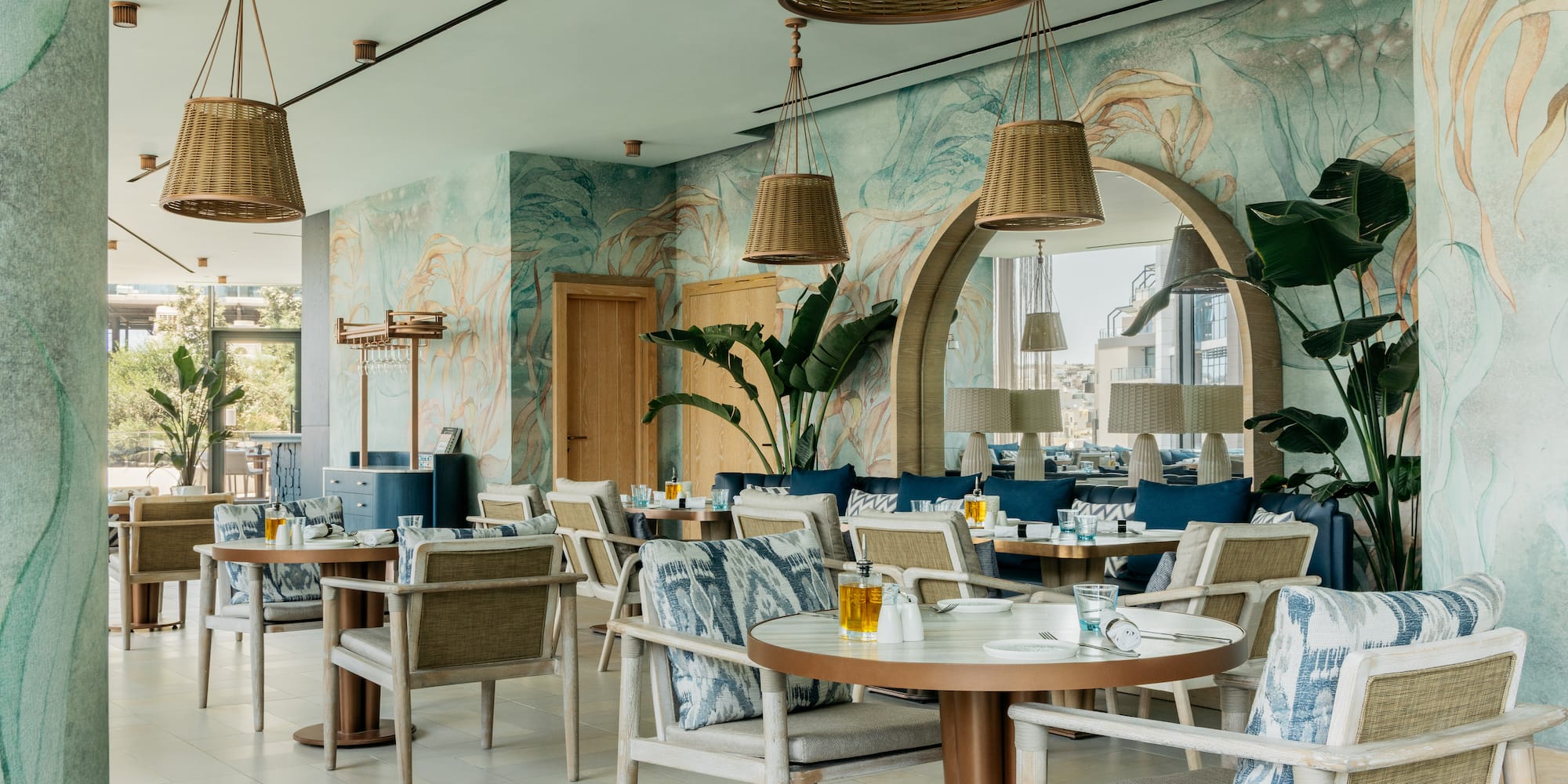 a restaurant with tables and chairs