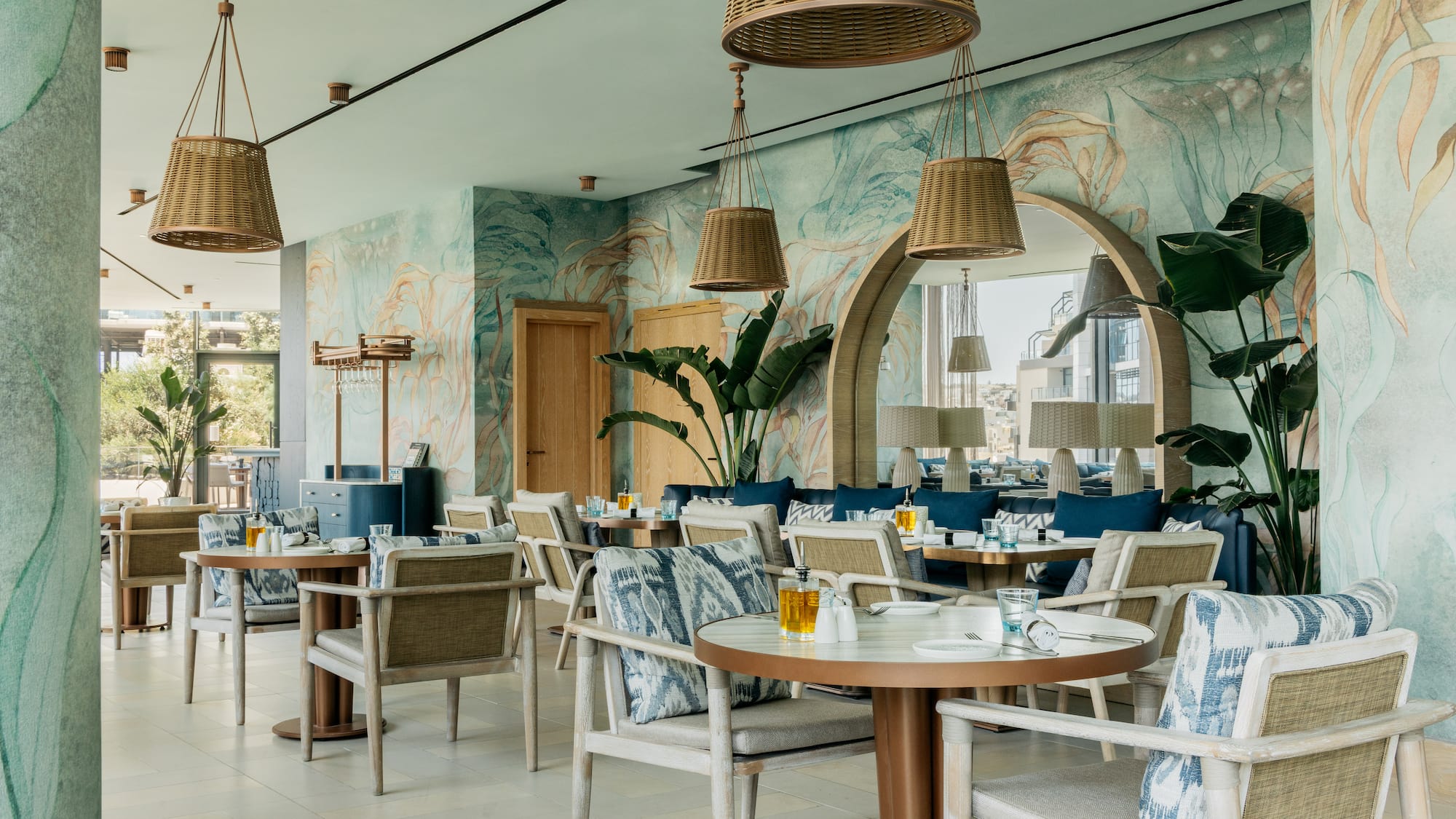 a restaurant with tables and chairs