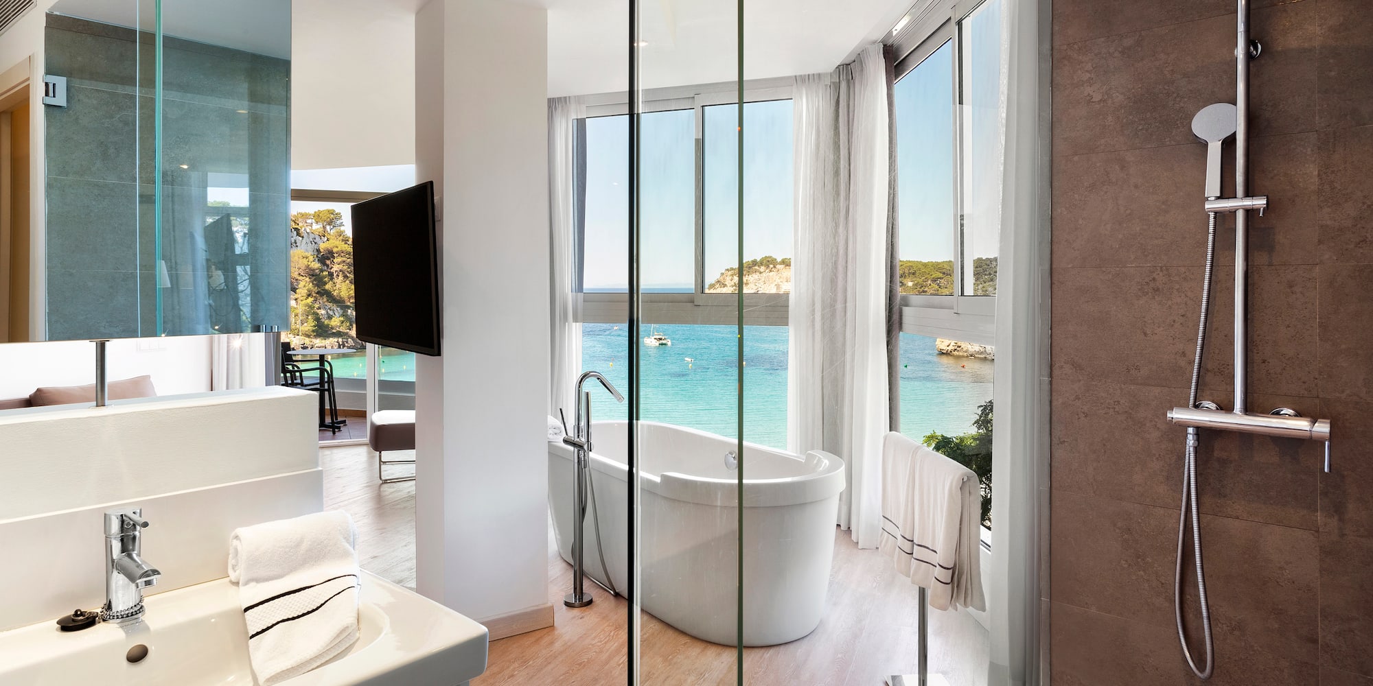 a bathroom with a tub and a sink