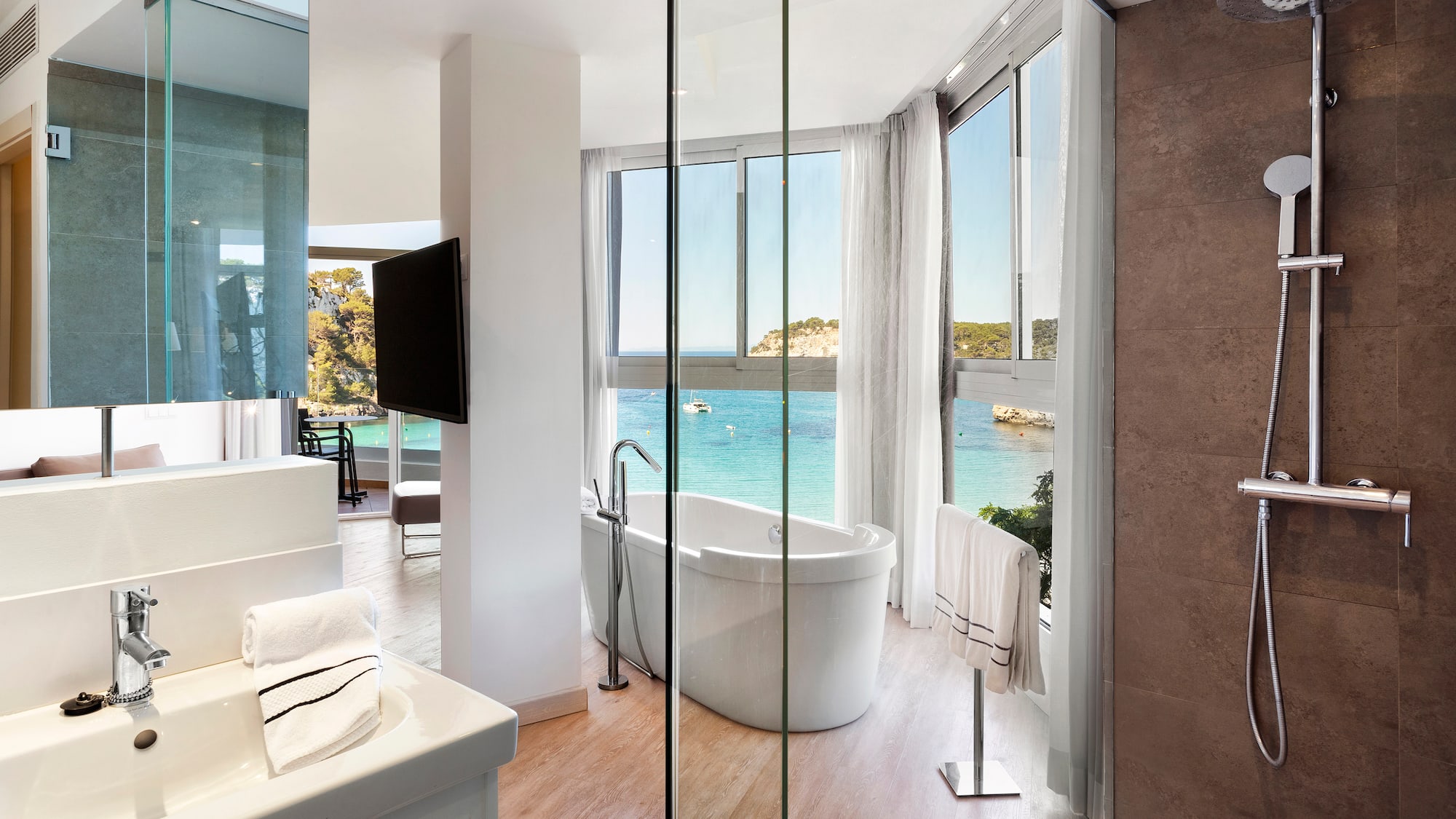 a bathroom with a tub and a sink