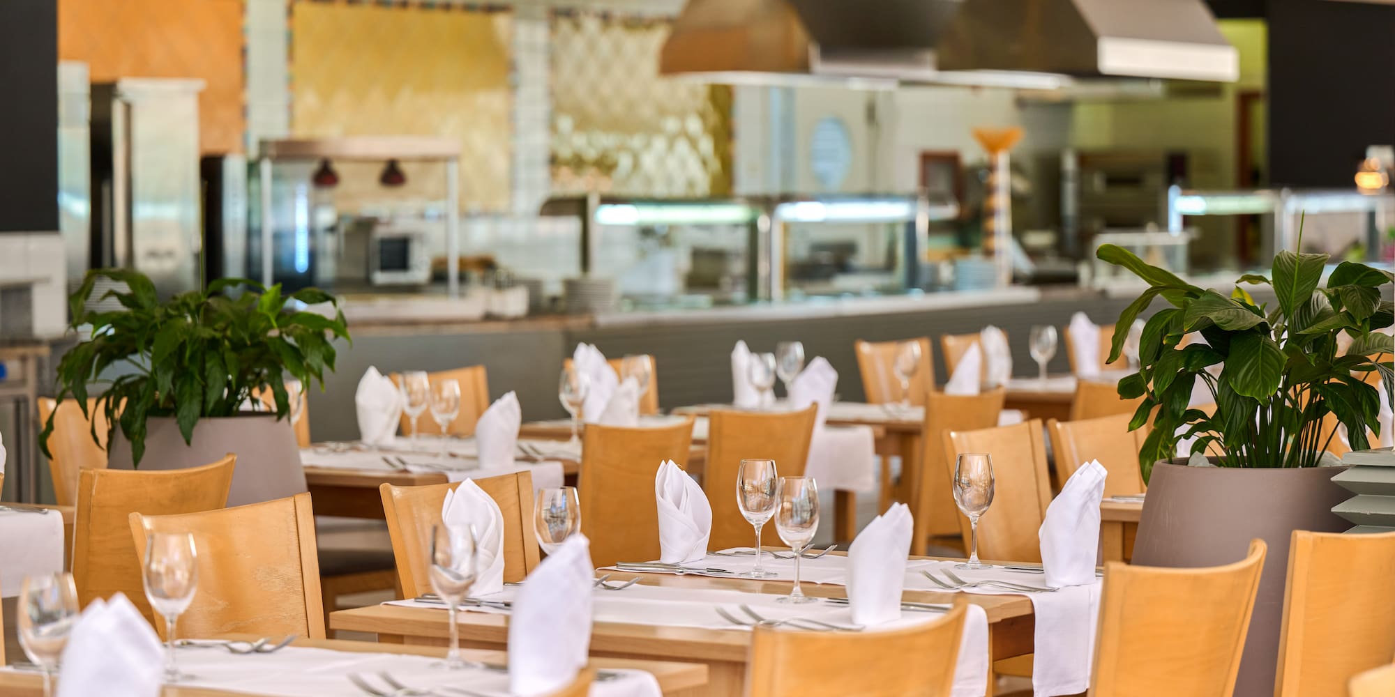 a restaurant with tables and chairs