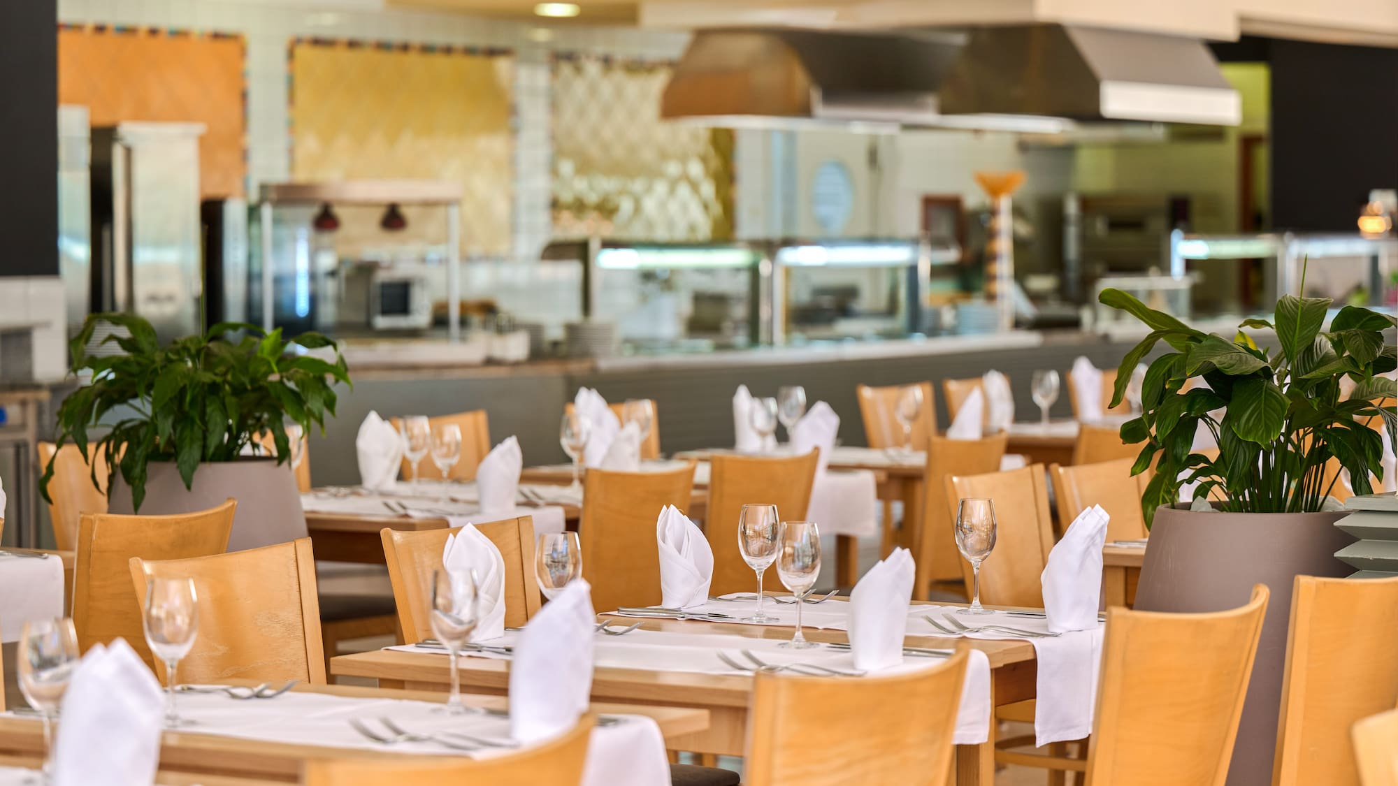 a restaurant with tables and chairs