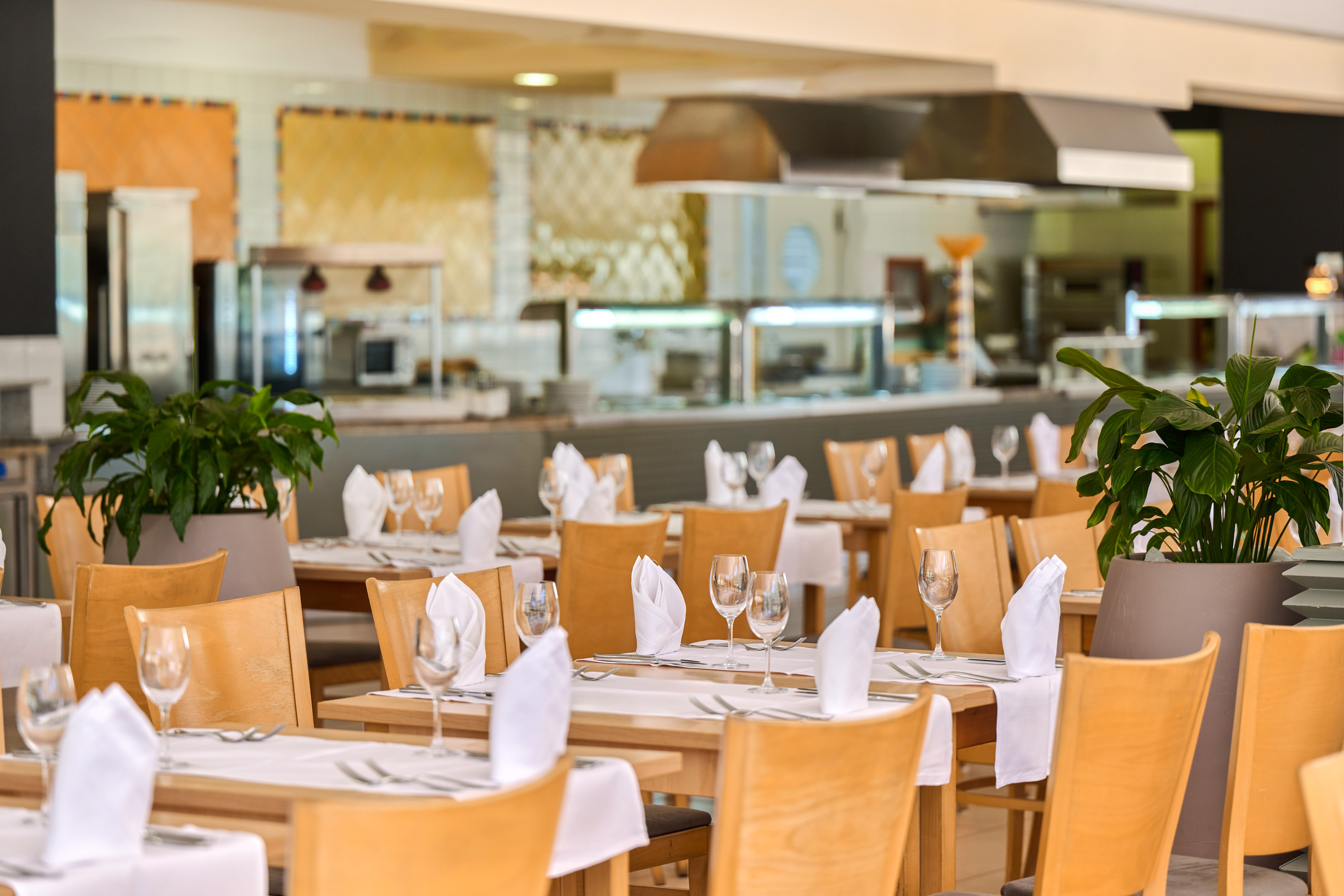 a restaurant with tables and chairs