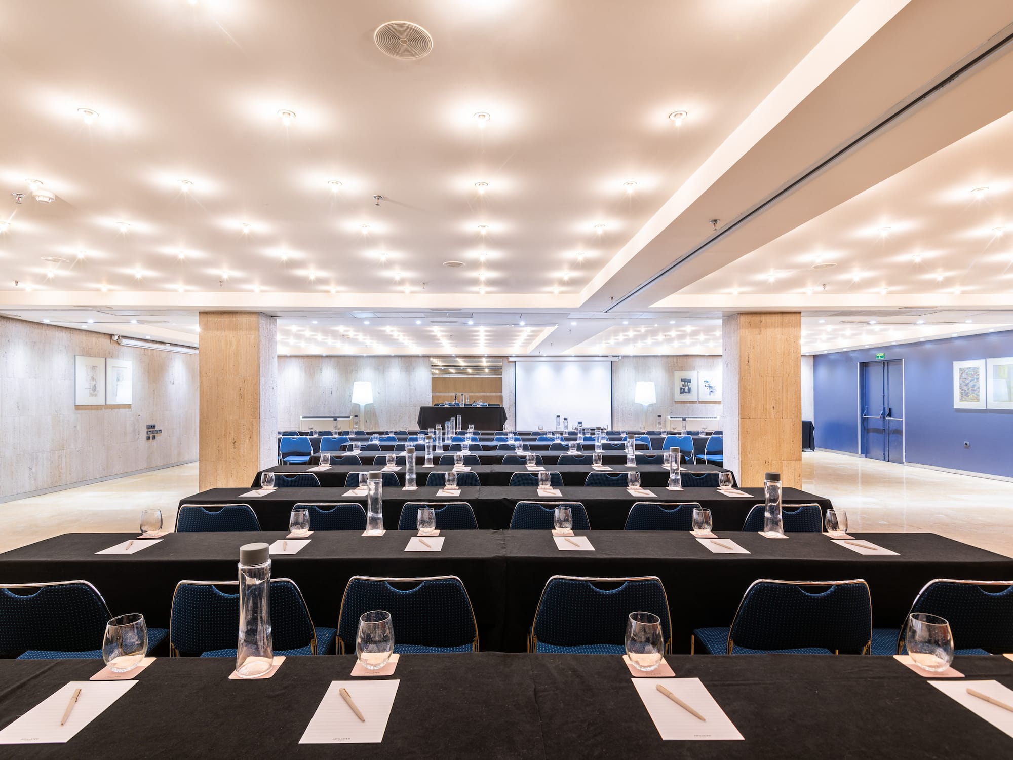 a room with tables and chairs