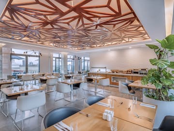 a room with tables and chairs