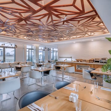 a room with tables and chairs