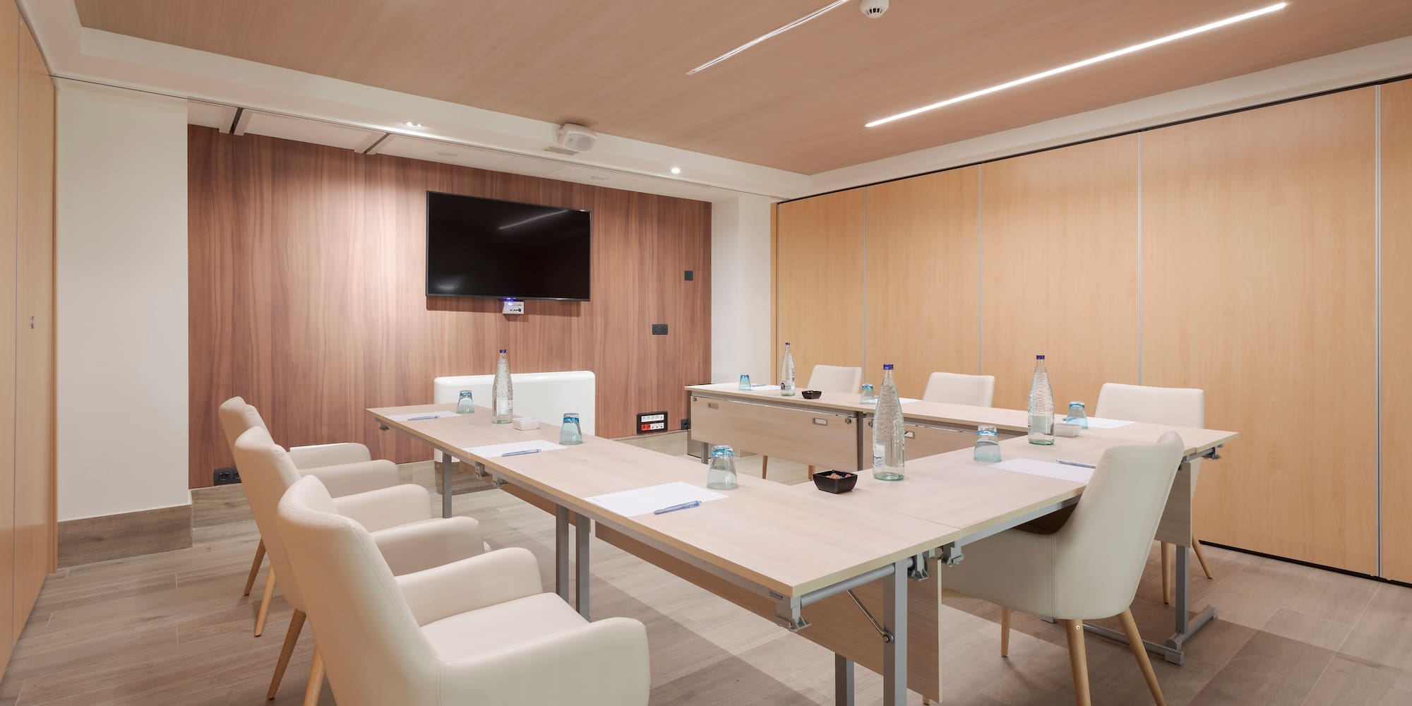 a room with a table and chairs