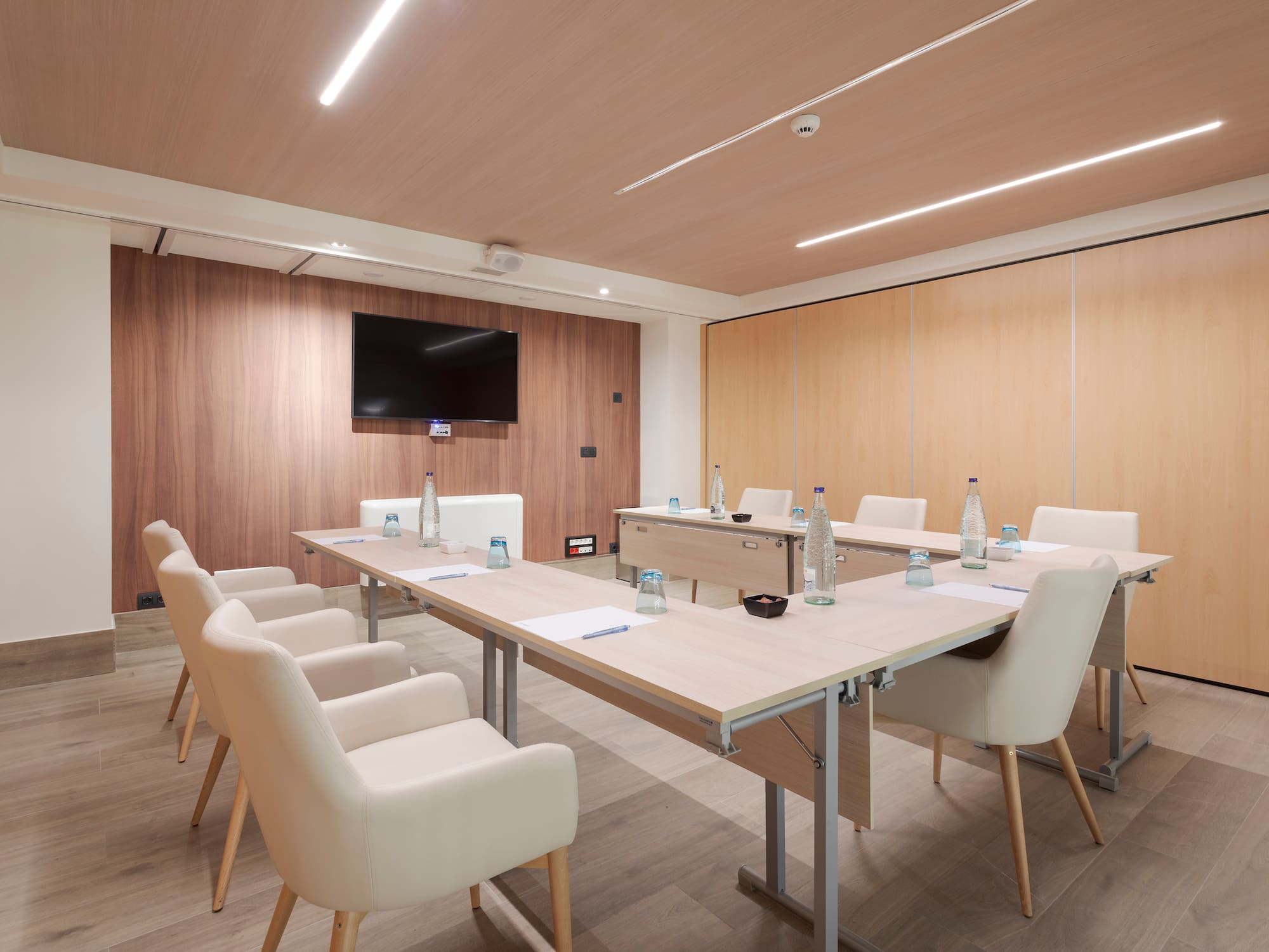 a room with a table and chairs