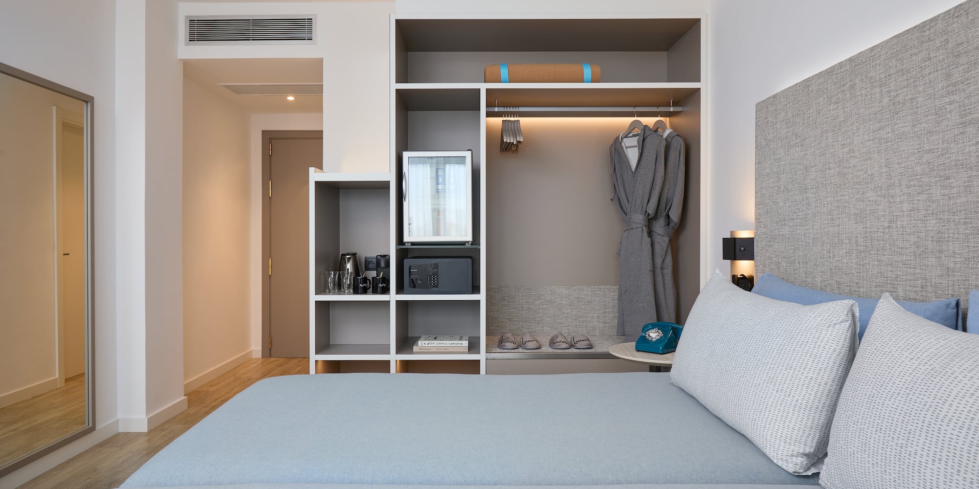 a room with a bed and a closet