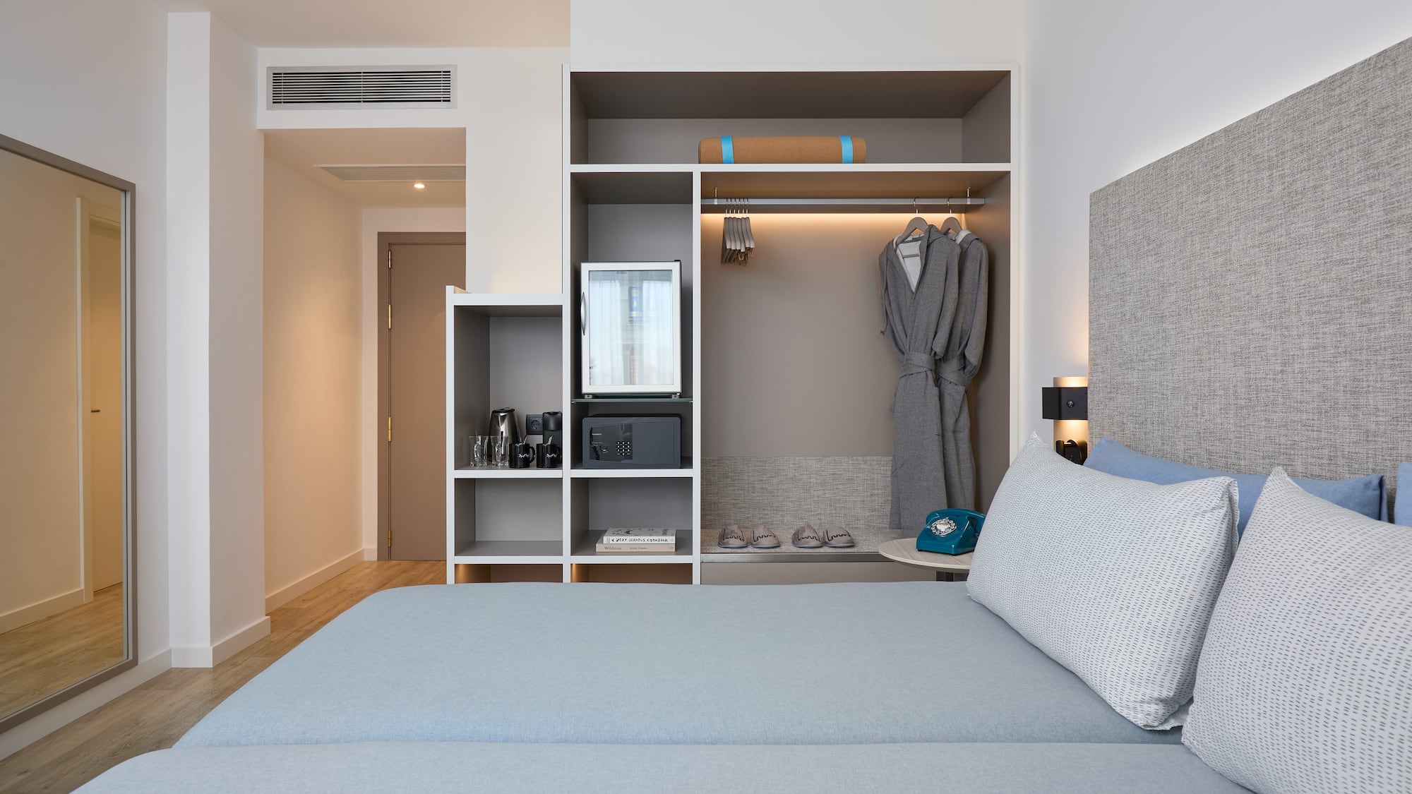 a room with a bed and a closet