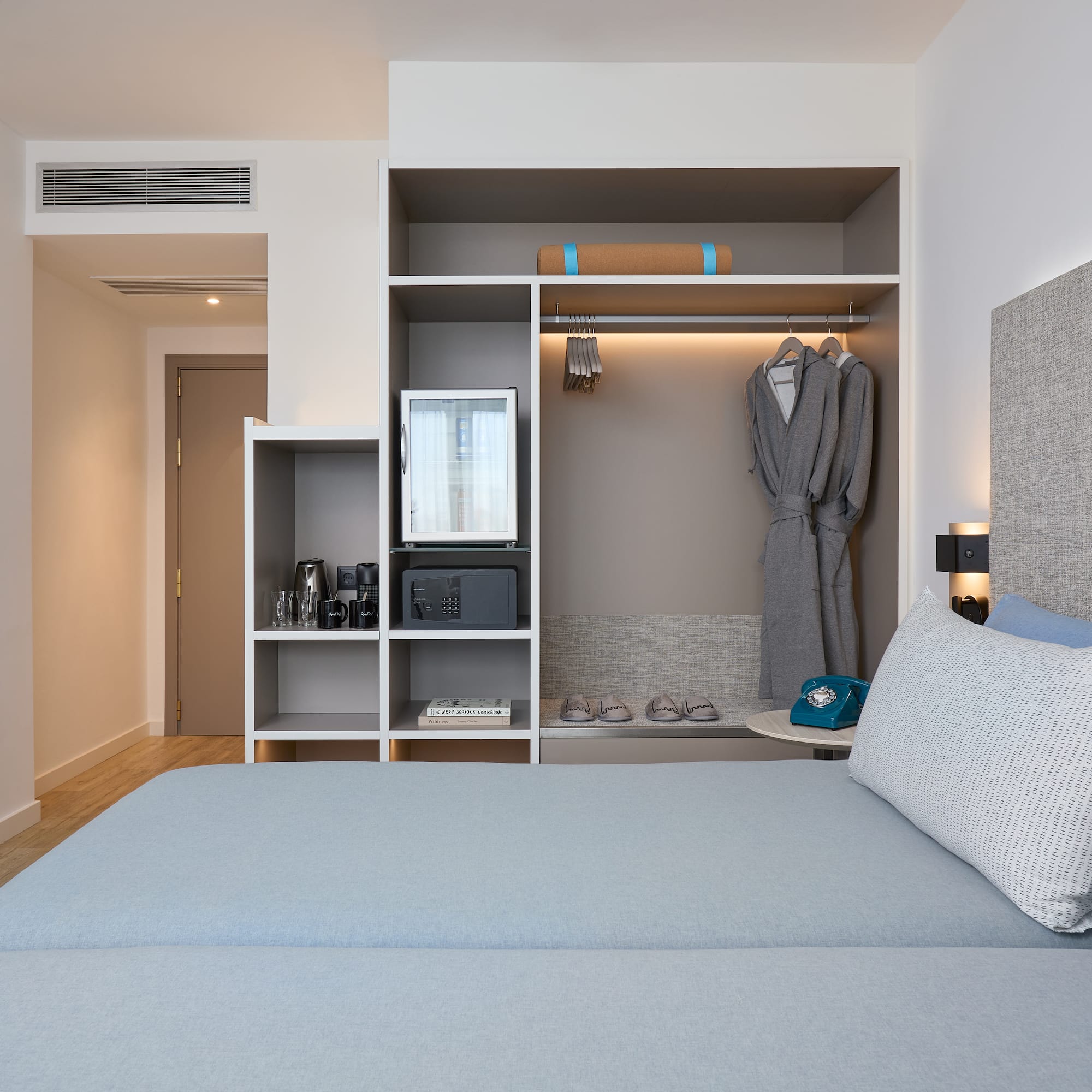 a room with a bed and a closet